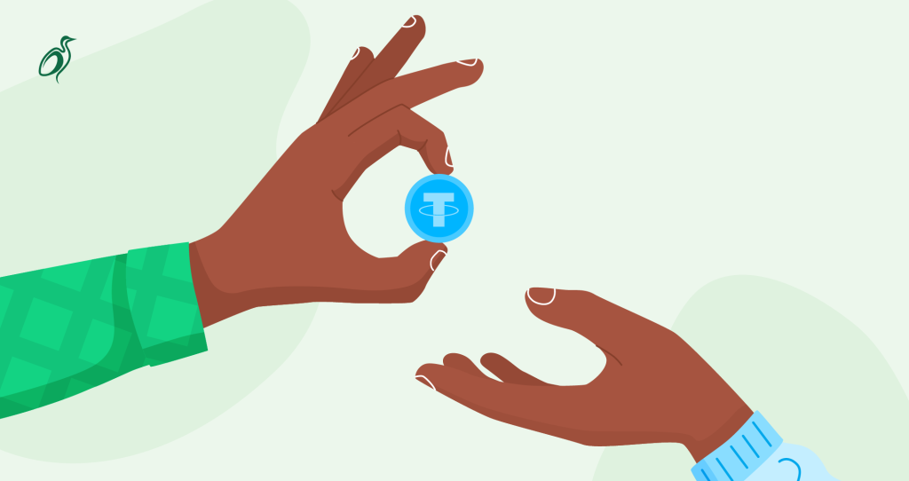 An image of hands exchanging a digital currency coin to reflect how freelancers receive USDT in Nigeria